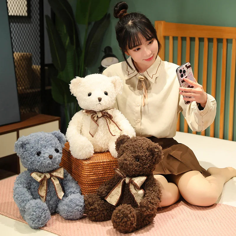 Fluffy Pink Teddy Bear with Patterned Bow