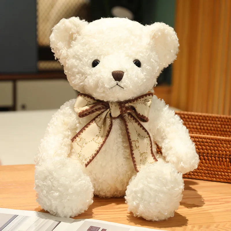 Fluffy Pink Teddy Bear with Patterned Bow