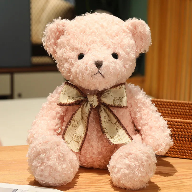 Fluffy Pink Teddy Bear with Patterned Bow