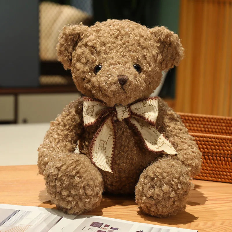 Fluffy Pink Teddy Bear with Patterned Bow
