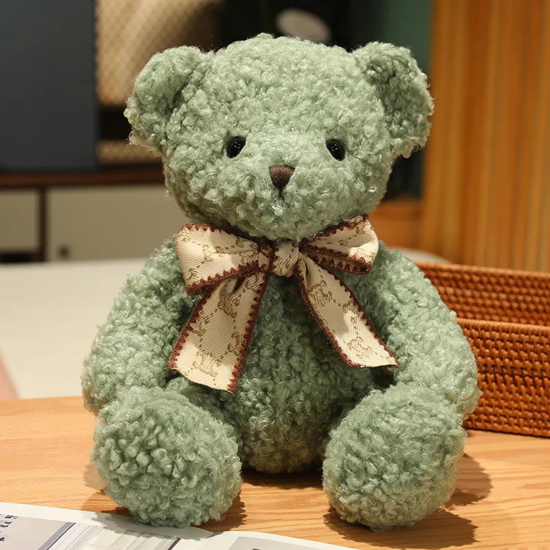 Fluffy Pink Teddy Bear with Patterned Bow