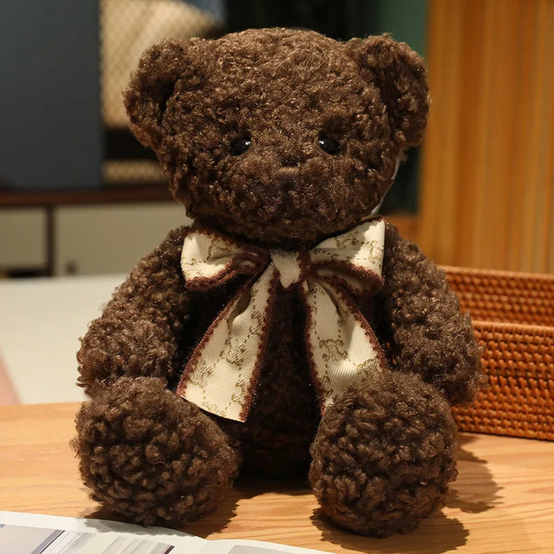 Fluffy Pink Teddy Bear with Patterned Bow
