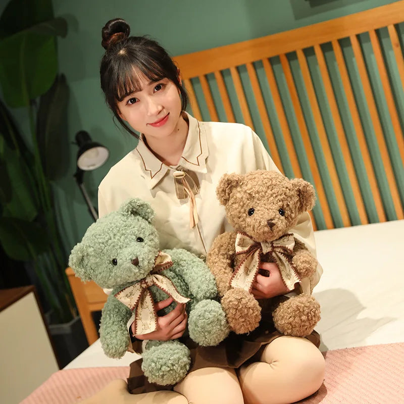 Fluffy Pink Teddy Bear with Patterned Bow