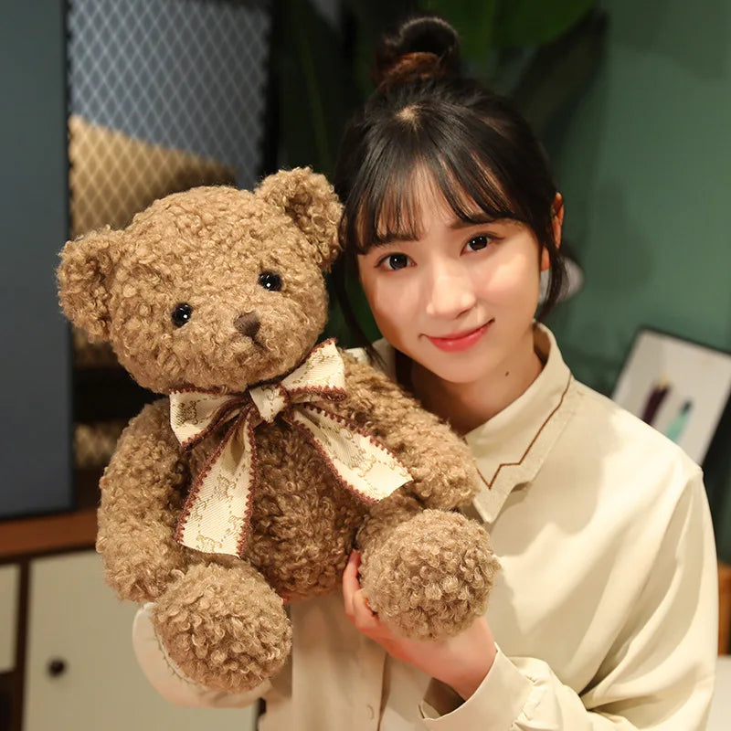 Fluffy Pink Teddy Bear with Patterned Bow